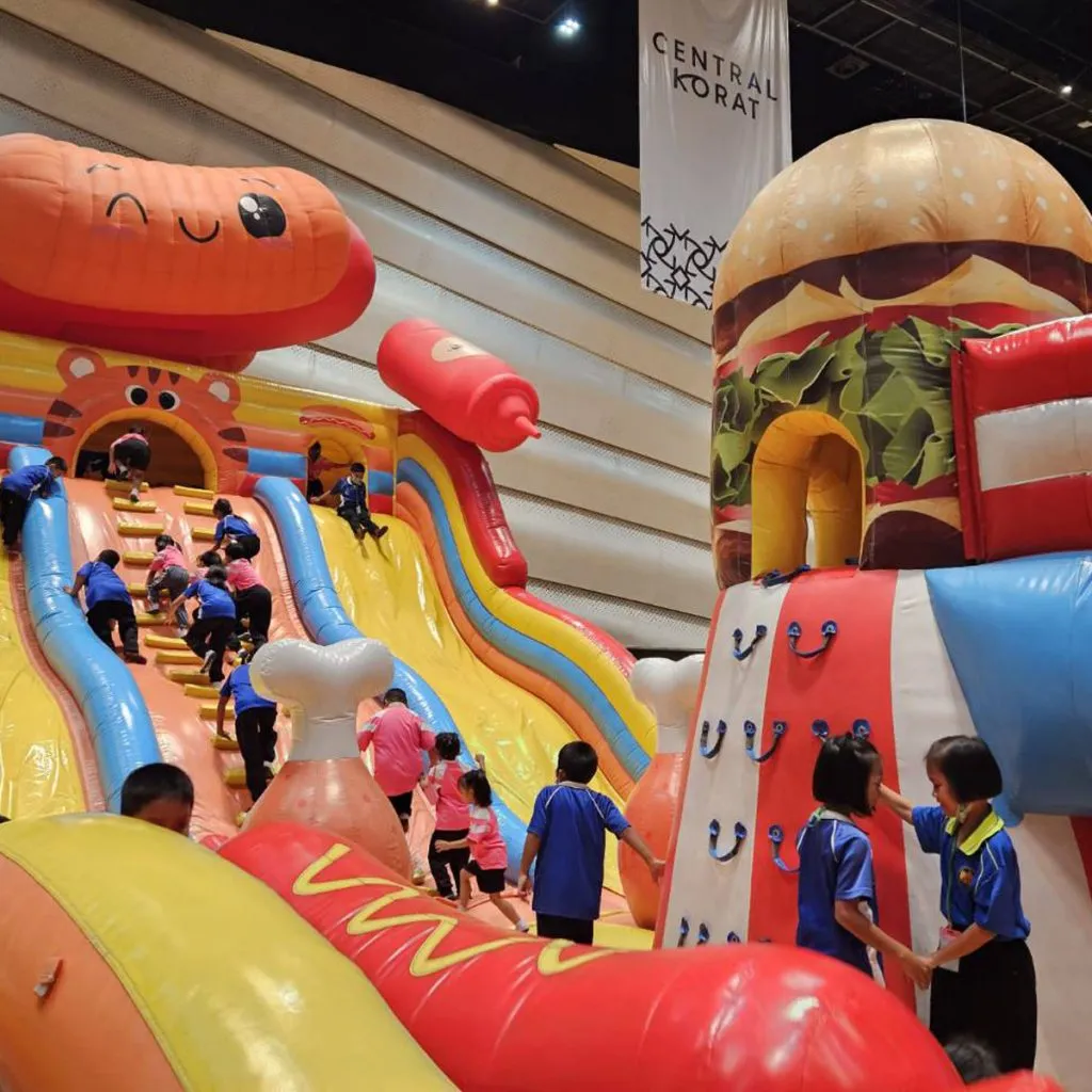 Jumptopia inflatable playground with red arch